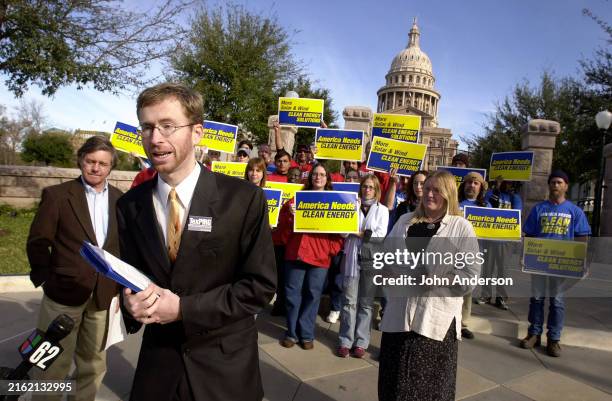 American environmental activist Luke Metzger speaks to the press conference during a clean energy rally outside the Texas State Capitol, Austin,...