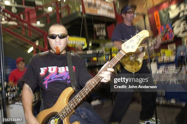 Members of Panamanian Latino and Ska group Los Rabanes perform during the South by Southwest music festival at Tower Records, Austin, Texas, March...