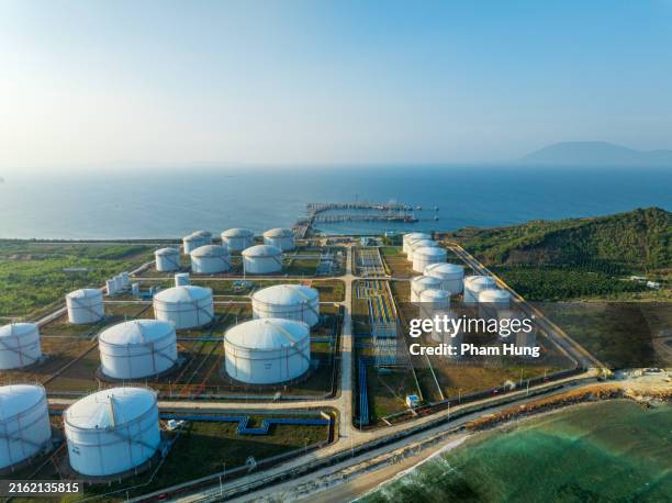 gasoline tanks on hon my giang - oil industry stock pictures, royalty-free photos & images