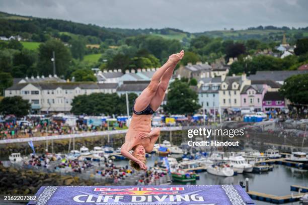 In this handout image provided by Red Bull, Archie Biggin of the UK dives from the 27 metre platform during the final competition day of the fourth...