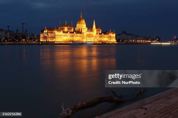 View of the Parliament Building and Danuve river in Budapest, Hungary on July 20, 2024.