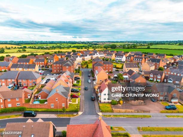 english housing estate in milton keynes, uk - pov house stock pictures, royalty-free photos & images