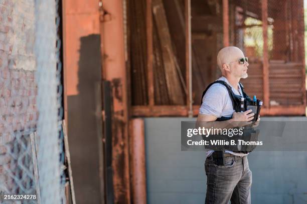 vigilant guard - bulletproof vest stock pictures, royalty-free photos & images