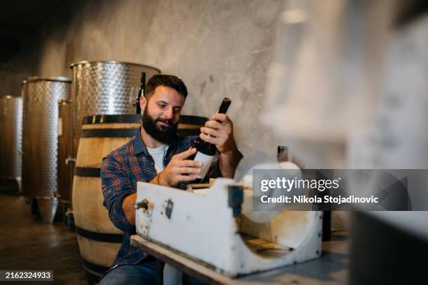 time to put label on it - labelling stock pictures, royalty-free photos & images