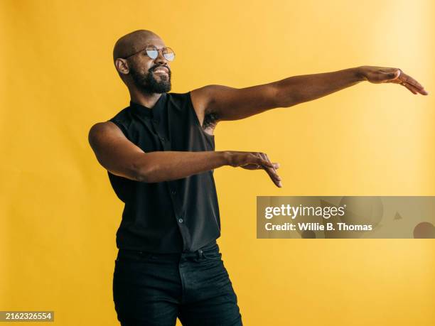 expressive movement - sleeveless stock pictures, royalty-free photos & images