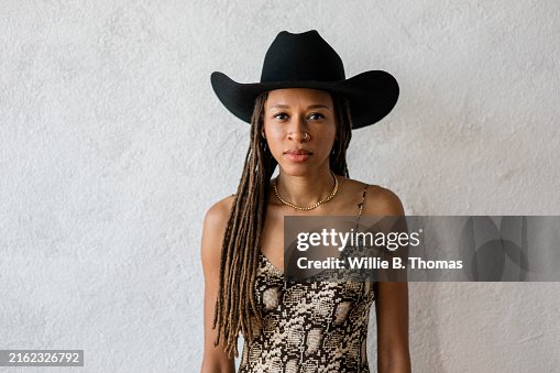 Woman in Black cowboy hat Woman in Black cowboy hat