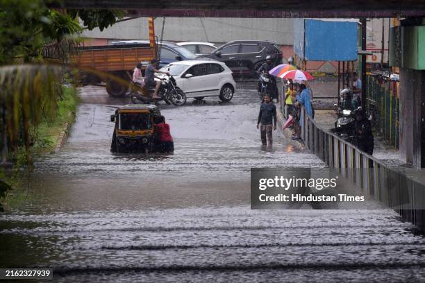 Heavy rains causes water logging at Sanpada Railway Subway on July 21, 2024 in Navi Mumbai, India.