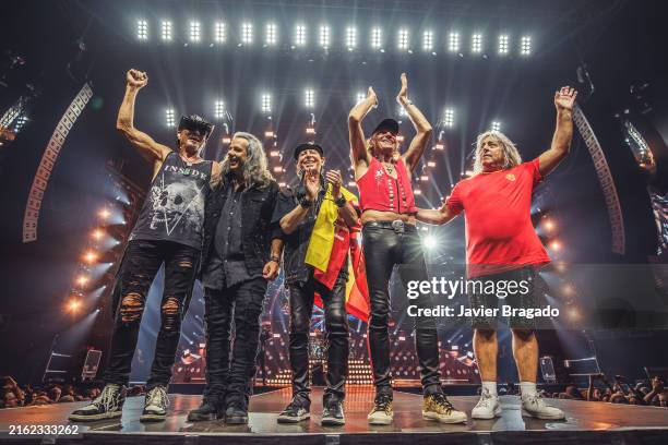 Rudolf Schenker, Paweł Mąciwoda, Klaus Meine, Matthias Jabs and Mikkey Dee of Scorpions perform in concert at Wizink Center on July 16, 2024 in...