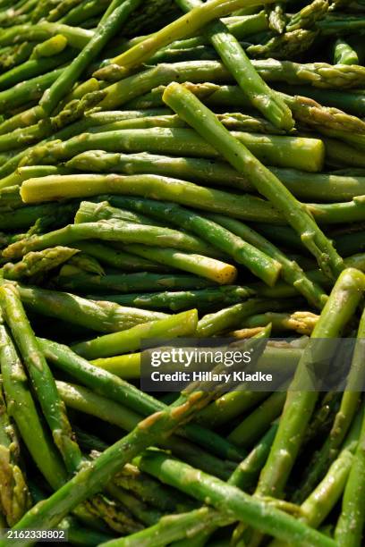 close up of cooked green asparagus - asparagus stock pictures, royalty-free photos & images