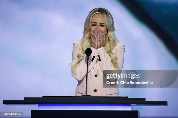 Anne Fundner reacts while speaking on stage on the second day of the ...