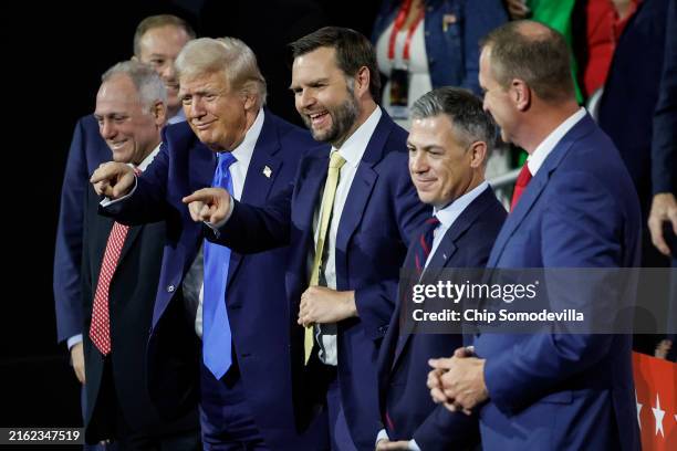 Republican presidential candidate, former U.S. President Donald Trump and Republican vice presidential candidate, U.S. Sen. J.D. Vance point to the...