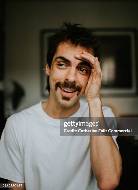 portrait of an embarrassed man - head in the sand stock pictures, royalty-free photos & images