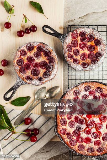 cherry clafouti - traditional french sweet fruit dessert . cake with cherry. cherry cake. sour cherry cake. cherry clafoutis - baking pan stock pictures, royalty-free photos & images