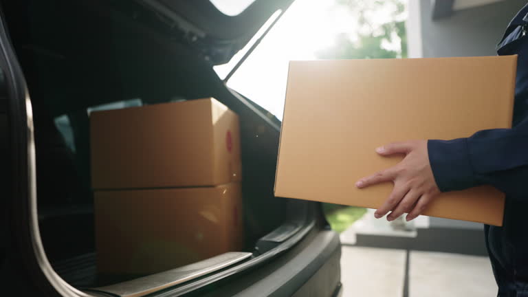 https://media.gettyimages.com/id/2162427176/video/delivery-courier-loading-cardboard-boxes-into-the-car.jpg?b=1&s=640x640&k=20&c=6utfxWtL6c553DUeQ4wnE-SuPzFjK6bmIYz8ZbwhYBk=