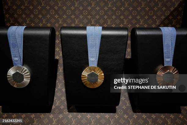 The 2024 Paris Olympic Games medals are displayed inside a custom-designed trunk manufactured by Louis Vuitton, an LVMH brand partner of the Paris...