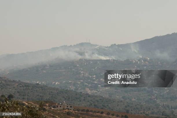 Smoke rises from the area as a result of Israeli attacks on the towns of Odaisseh and Khiam in southern Lebanon on July 22, 2024.