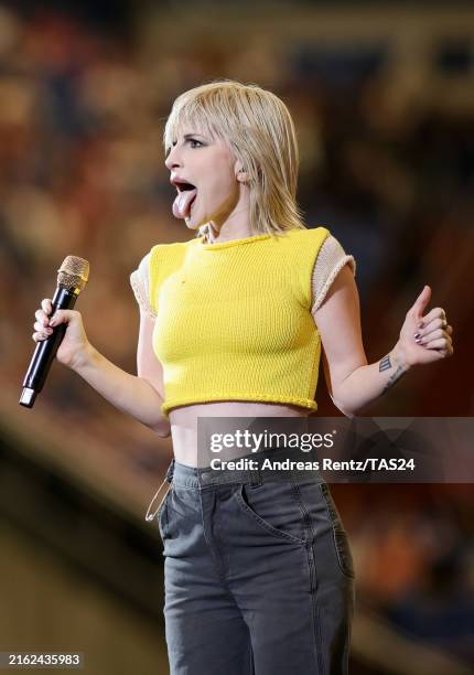 Hayley Williams of Paramore performs onstage ahead the "Taylor Swift | The Eras Tour" at Veltins Arena on July 17, 2024 in Gelsenkirchen, Germany.