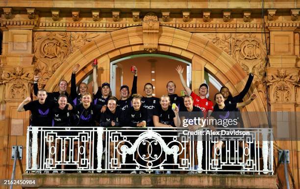 The England team pose for a photo on the Lord's Balcony after victory in the 5th Women's Vitality IT20 between England and New Zealand at Lord's...