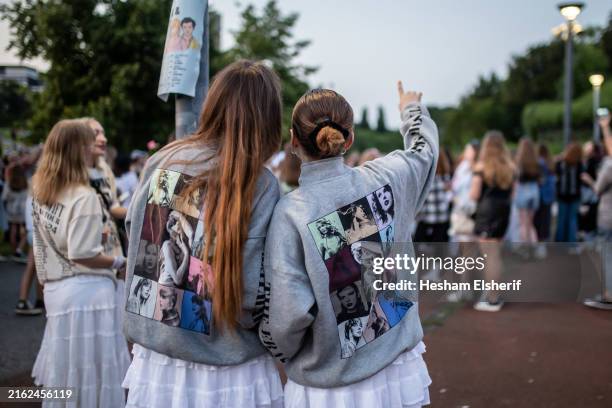 Taylor Swift fans without tickets gather in front of the Veltins Arena during the pop singer's concert on July 17, 2024 in Gelsenkirchen, Germany. In...