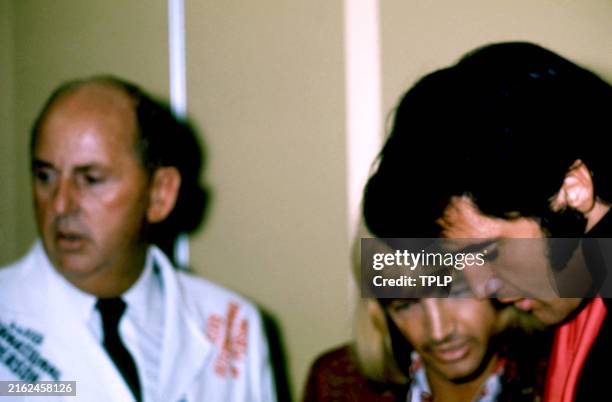 American rock and roll musician Elvis Presley gives a press conference following his first show at the Showroom International Hotel in Las Vegas,...