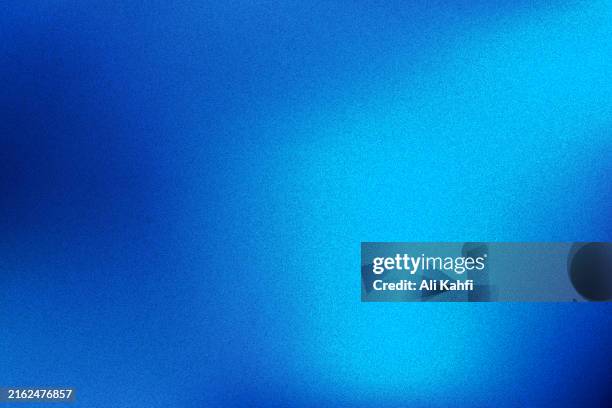 abstract modern dynamic colors background. grainy texture background style - blue gradient texture background stock illustrations