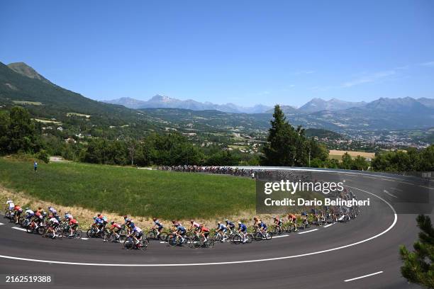General view of the peloton passing through a landscape during the 111th Tour de France 2024, Stage 18 a 179.5km stage from Gap to Barcelonnette...