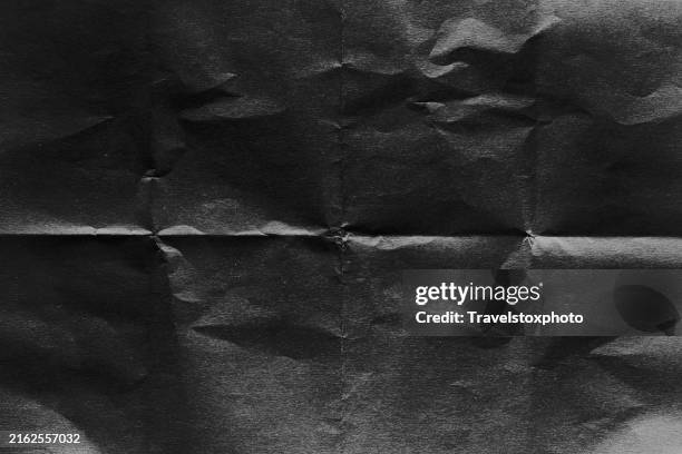 black used paper, dark rough. grunge paper texture. space for new creative ideas. texture of crumpled dark paper. innovative business idea. paper texture background. textured paper. blank sheet of paper. - plié photos et images de collection