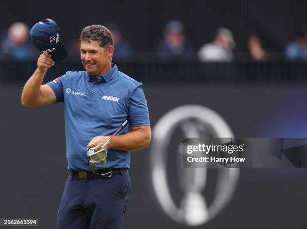 Padraig Harrington of Ireland acknowledges the crowd after finishing his round on the 18th green during day two of The 152nd Open championship at...