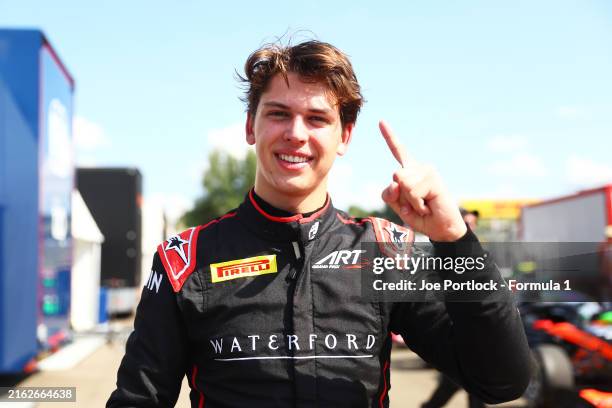 Pole position qualifier Laurens van Hoepen of Netherlands and ART Grand Prix celebrates in parc ferme during qualifying ahead of Round 8 Budapest of...