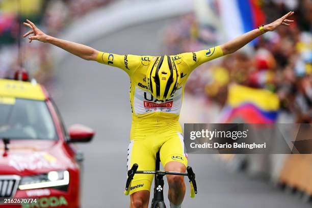 Tadej Pogacar of Slovenia and UAE Team Emirates - Yellow Leader Jersey celebrates at finish line as stage winner during the 111th Tour de France...