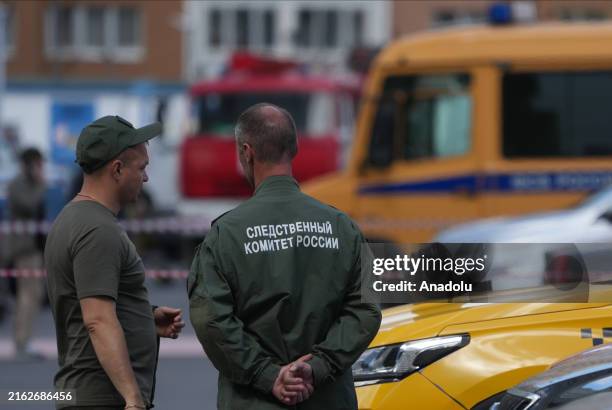 Investigative Committee of the Russian Federation teams conduct a large-scale investigation at the scene following an explosion on a parked car in...