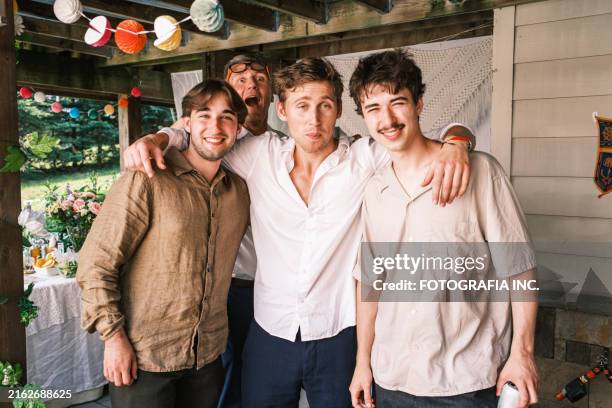 multi generation group of people at the outdoor wedding party - brother stock pictures, royalty-free photos & images