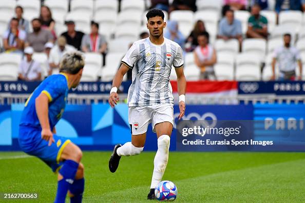 Zaid Tahseen Of Iraq Controls The Ball During The Men s Group B Match zaid-tahseen-of-iraq-controls-the-ball-during-the-men-s-group-b-match