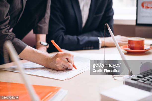negotiating a deal - notary stock pictures, royalty-free photos & images