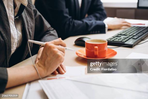 negotiating a deal - notaio foto e immagini stock