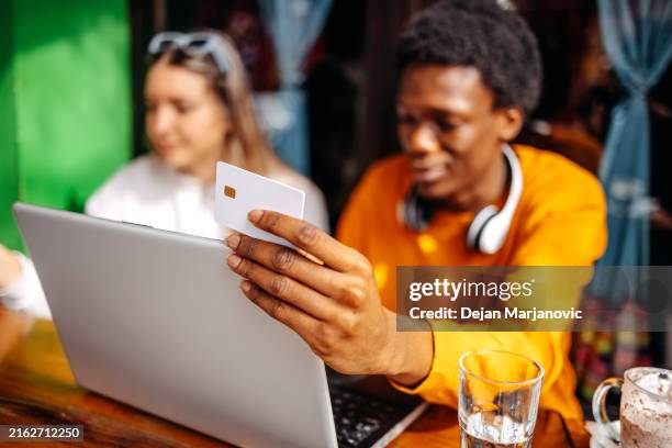 people paying in coffee shop with credit card - mobile payment stock pictures, royalty-free photos & images
