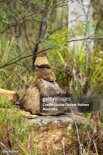 rock stack in the australian bush - bush land stock pictures, royalty-free photos & images