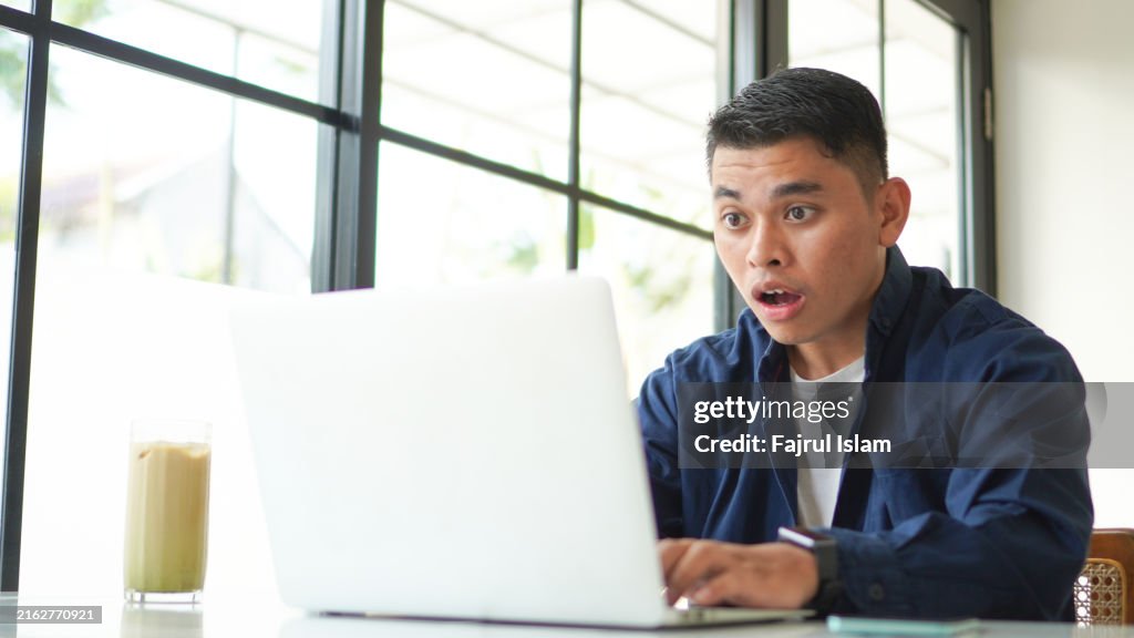 Shock expression with laptop