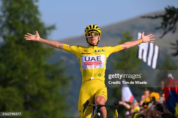 Tadej Pogacar of Slovenia and UAE Team Emirates - Yellow Leader Jersey celebrates at finish line as stage winner during the 111th Tour de France...