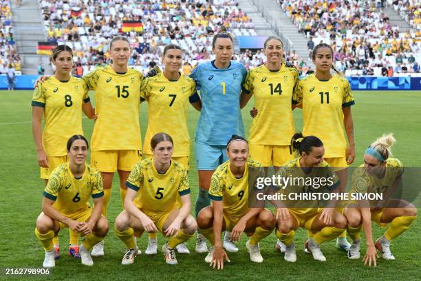 Australia's midfielder Kyra Cooney-Cross, Australia's defender Clare Hunt, Australia's defender Steph Catley, Australia's goalkeeper Mackenzie...