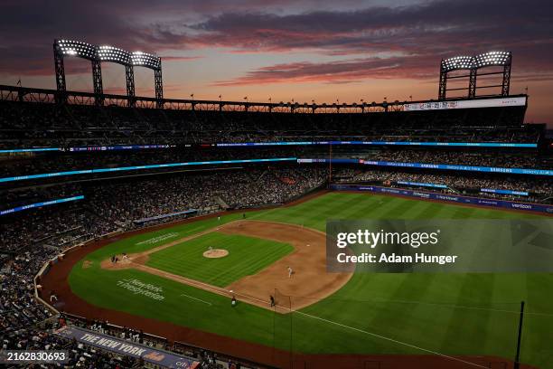 General view is seen as the sunsets during the fifth inning and Chris Sale of the Atlanta Braves pitches against the New York Mets at Citi Field on...