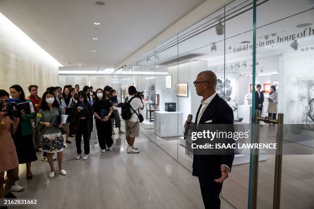Sotheby's Asia chairman Nicolas Chow speaks to the press during a media tour of the new two-storey 000 square foot Sotheby's space at Landmark Chater...