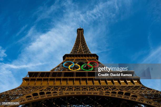 General view of the Eiffel Tower at as the Olympic Rings are displayed during previews ahead of the Paris 2024 Olympic Gameson July 20, 2024 in...