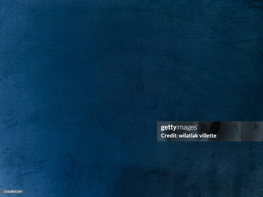 Dark blue fabric cloth polyester texture and textile background.