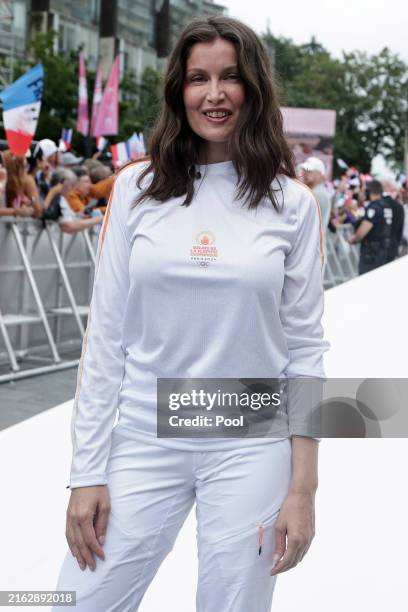 French actress Laetitia Casta during the 2024 Paris Olympic Games Torch Relay, on the day of the opening ceremony, on July 26, 2024 in Saint-Denis,...