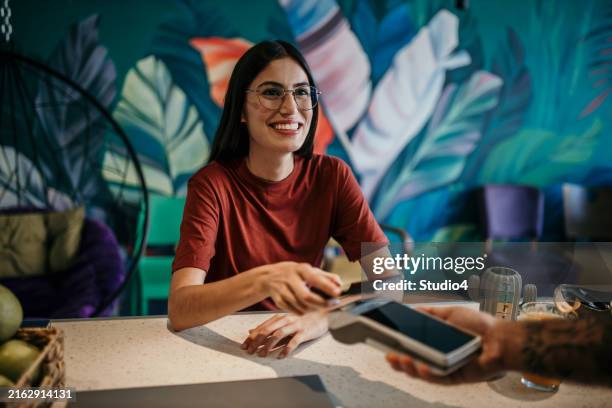 check for my coffee, please - digital wallet stock pictures, royalty-free photos & images