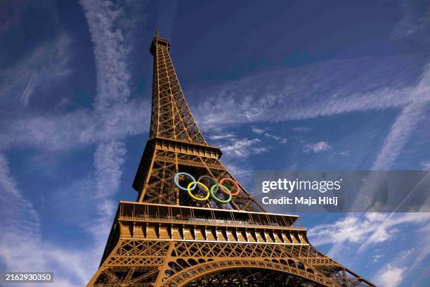 The Eiffel tower decorated with Olympic rings is seen on July 21, 2024 in Paris, France. The city is gearing up to host the XXXIII Olympic Summer...