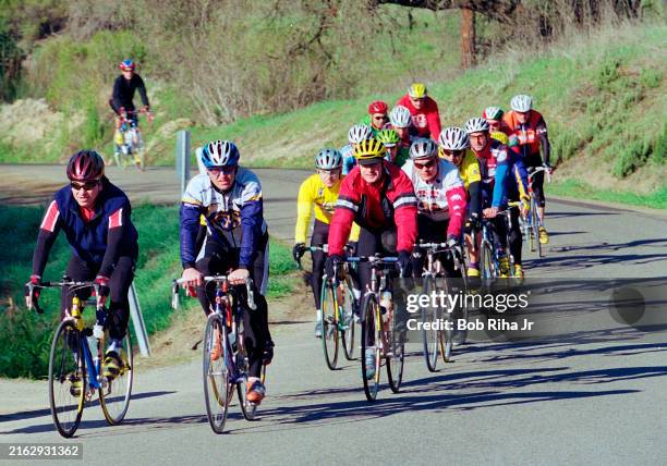 Cyclists on back roads training with United States Olympic Committee 1999 coach of the year and Cycling Technology Coach Chris Carmichael...