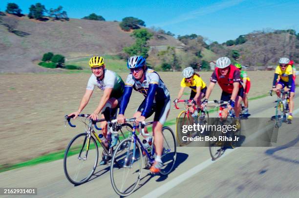 Cyclists on back roads training with United States Olympic Committee 1999 coach of the year and Cycling Technology Coach Chris Carmichael...