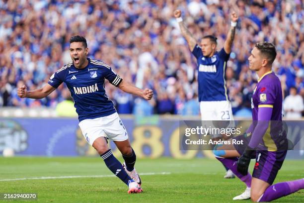 Falcao García from Millonarios celebrates the first goal of his team scored by his teammate Danovis Banguero during the match between Millonarios and...